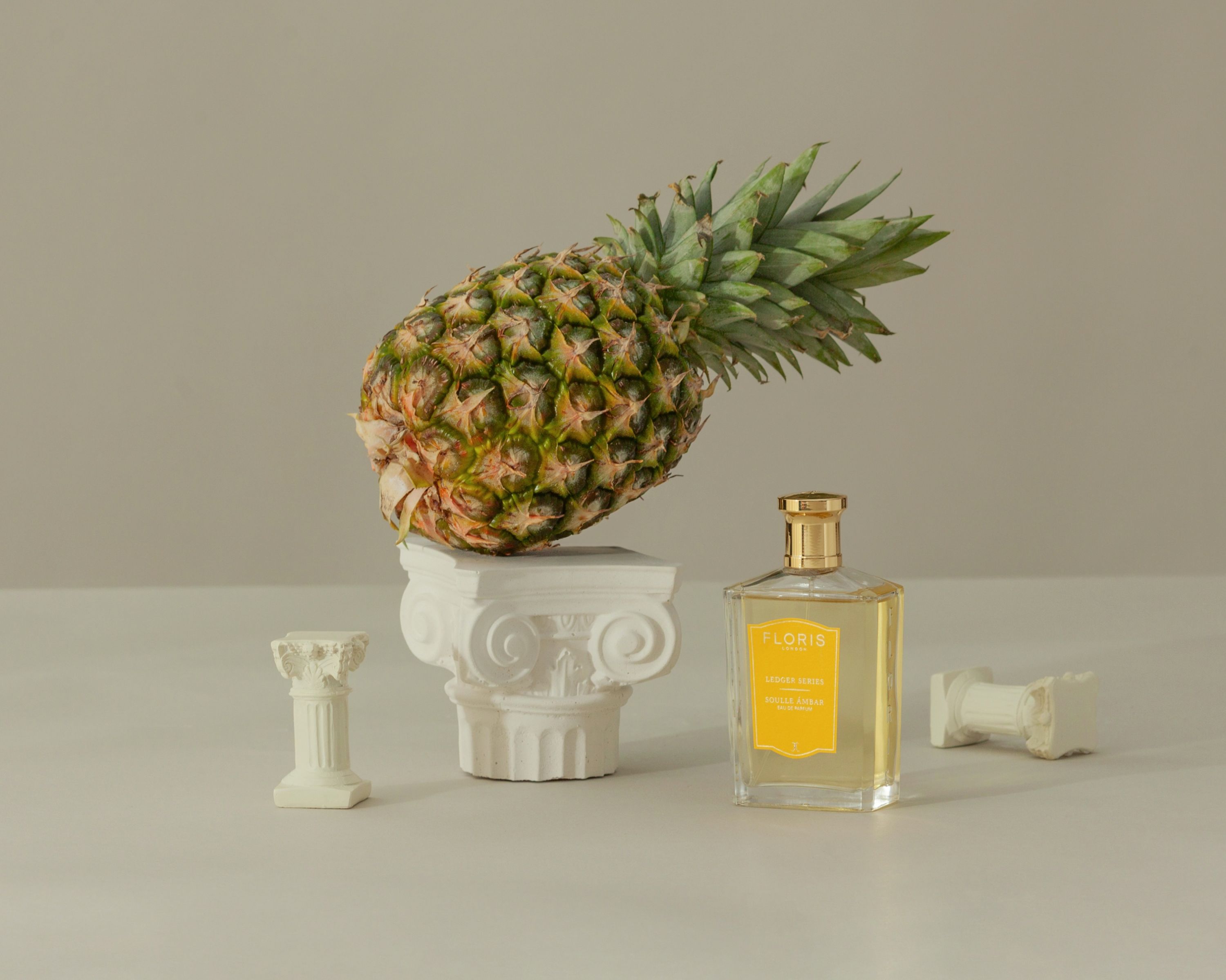 Soulle Ambar from Floris shown with a pineapple